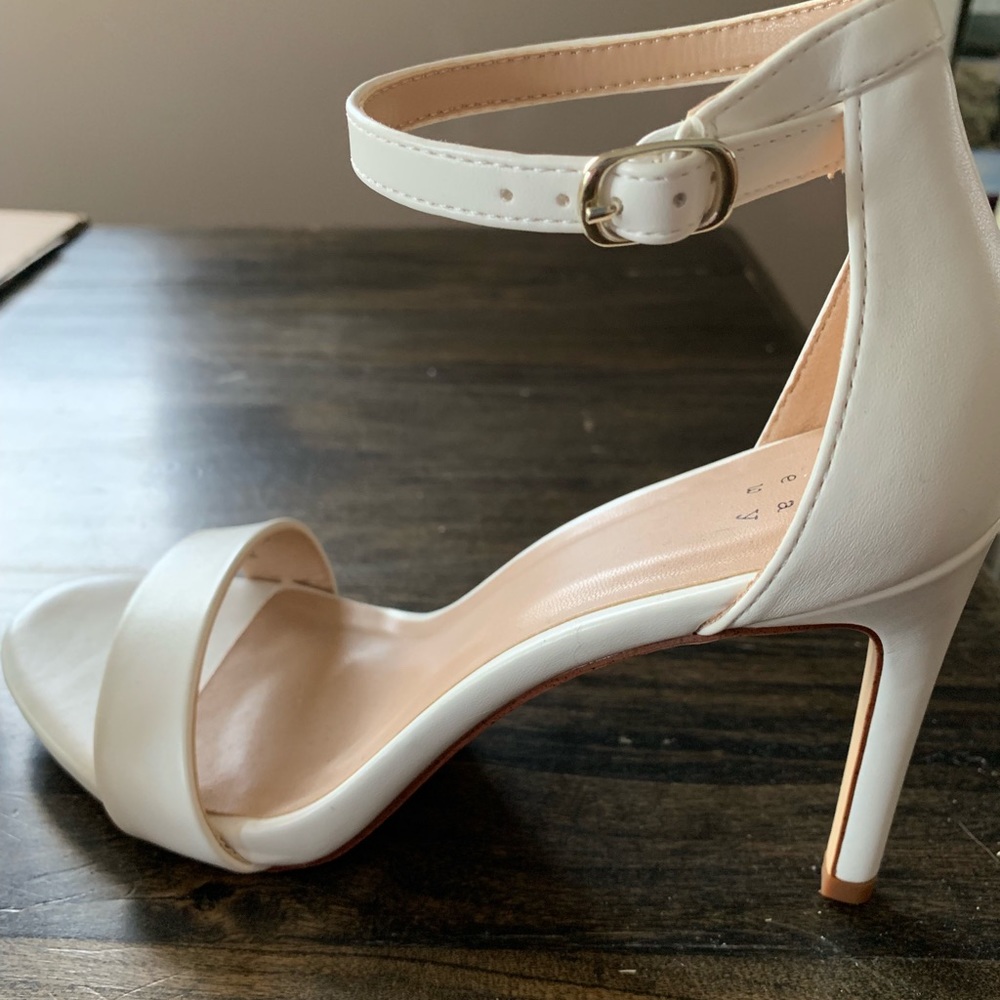 White open toed high heels